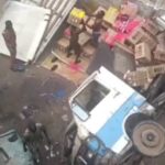 Truck falls off Lagos bridge, lands on bus station