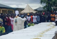 16 CASKETS, ONE GRAVE! Benue Community Buries Herdsmen Attack Victims